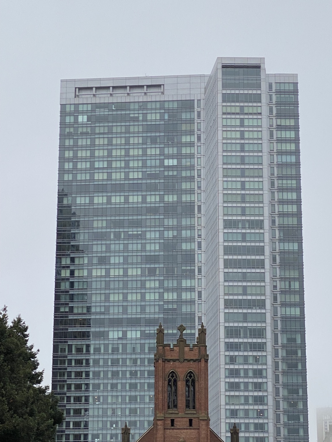 the glassthe glass tower, church cropped out, something in a window in the top left corner