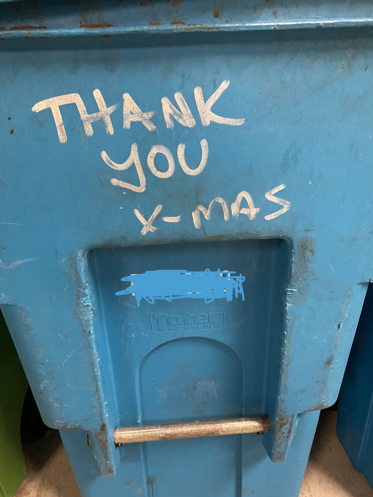 ecu a second blue san francisco rolling can for recyclables that someone has written "THANK YOU X-MAS" on, in white permanent marker, for reasons unknown to me