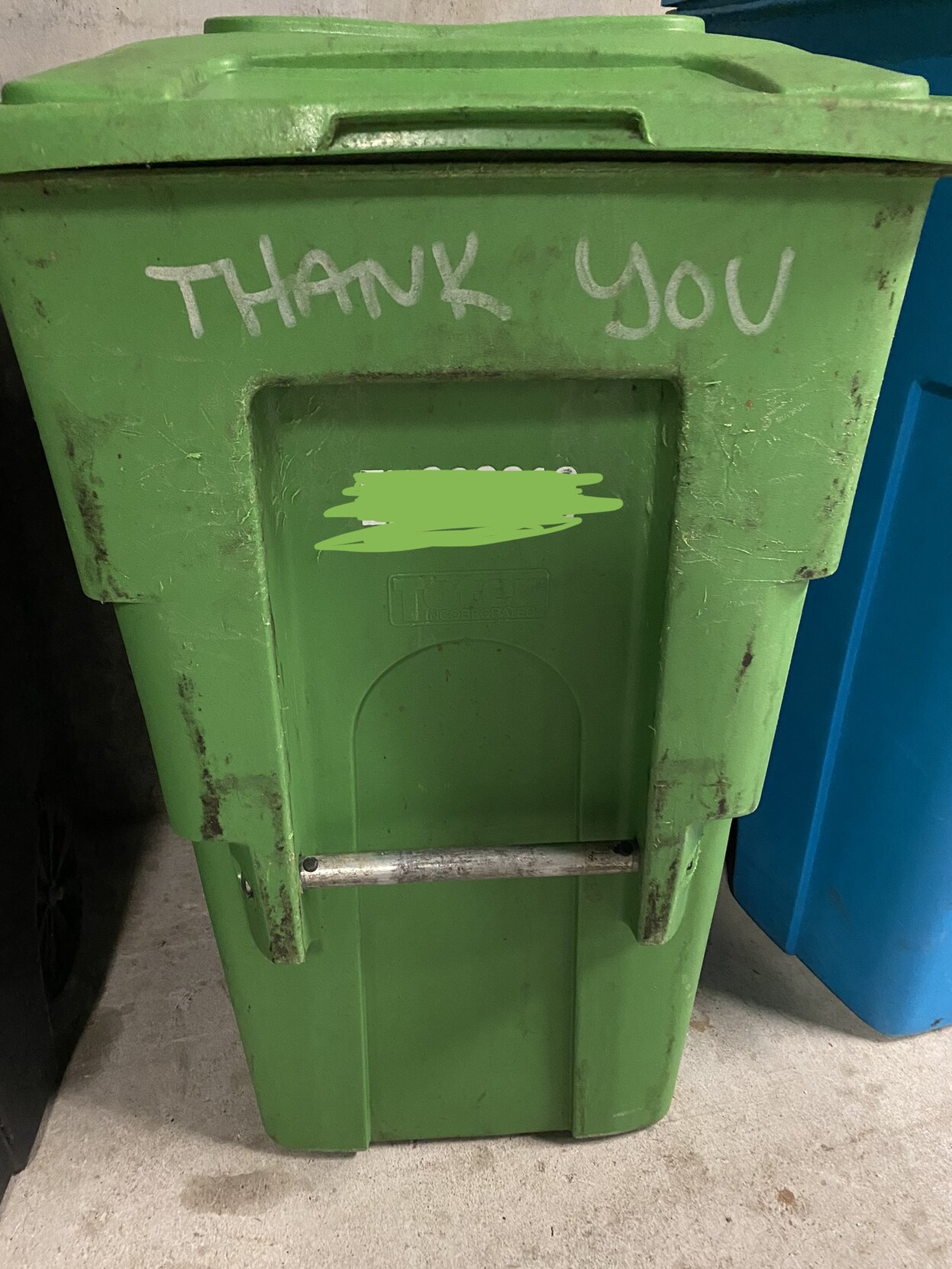 ecu a green san francisco rolling can for compostables that someone has written "THANK YOU" on, in white permanent marker, for reasons unknown to me