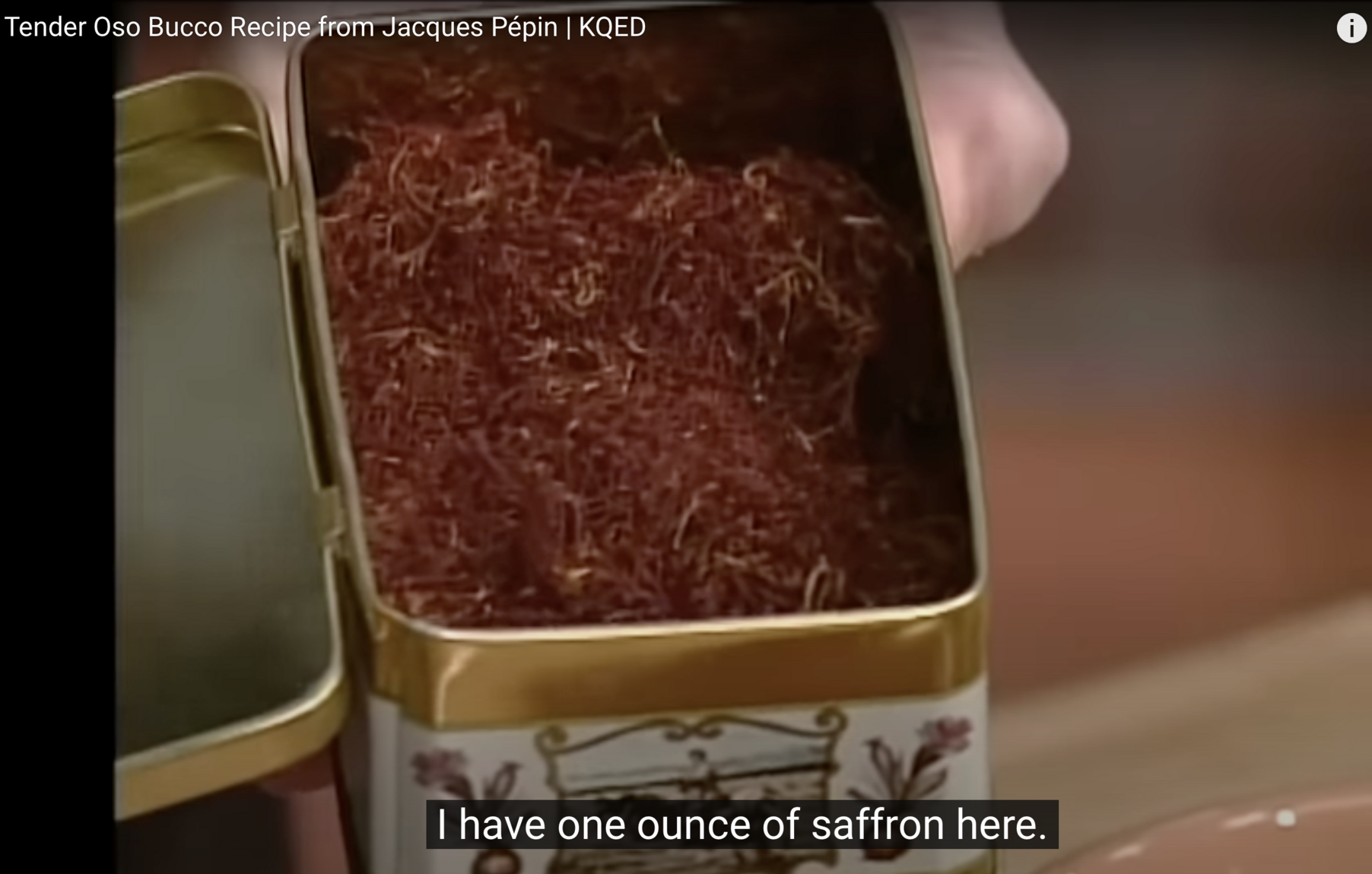 screenshot of video, ECU an open tin of an ounce of god damned safron, which is the size of two decks of cards stacked, close captioned “I have one ounce of saffron here.”