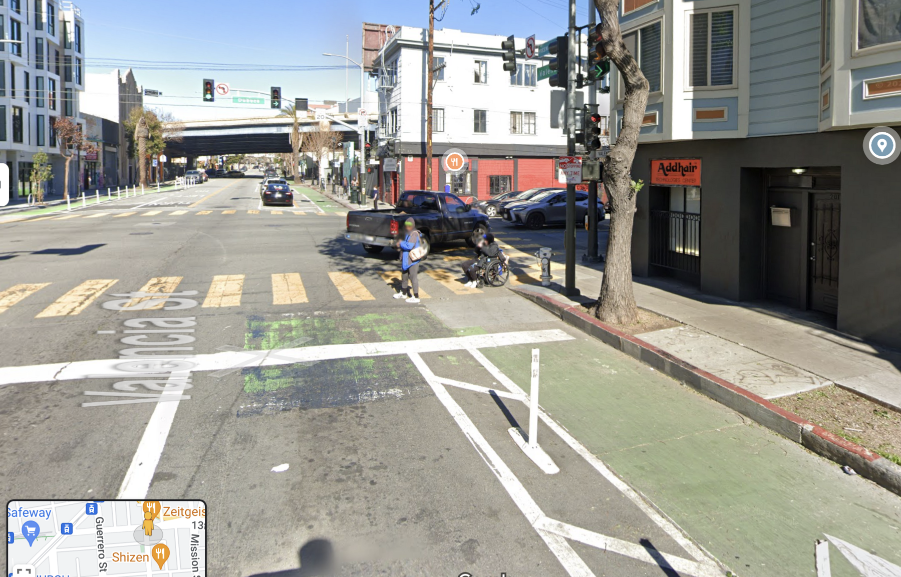 google street view of valenca northbound at 14th in the car right-turn-lane, the bike lane to it’s right