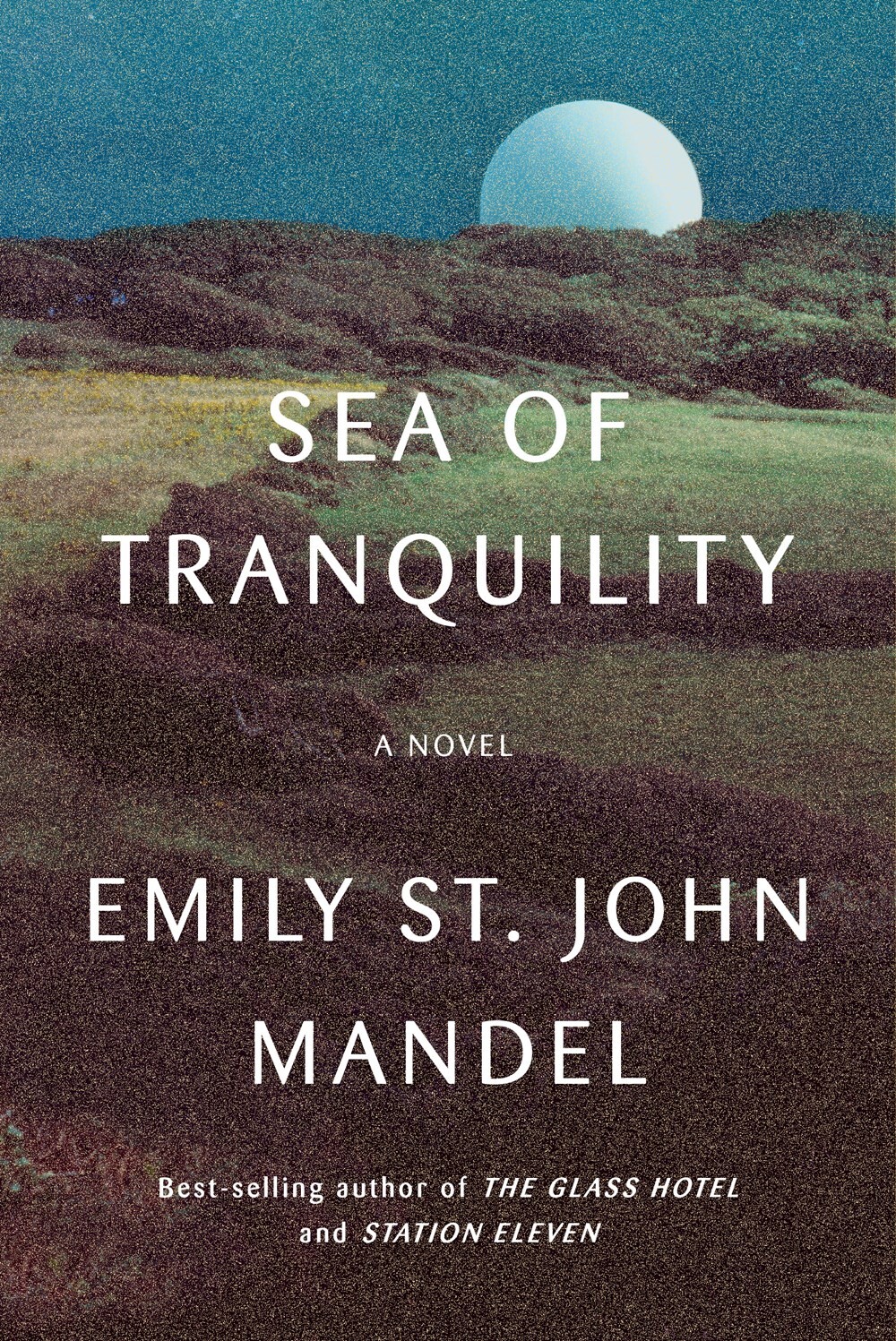 “Sea of Tranquility” cover, the moon rising over rolling green hills in the foreground, a forest in the background.