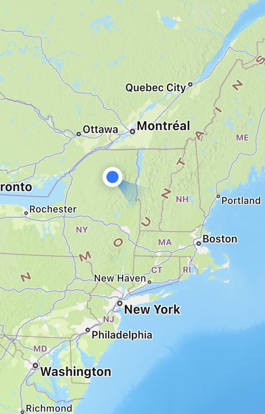 a map of the north east coast of north america including washington dc, new york, boston,  toronto, and montreal, a blue dot near the center indicating about where we stayed