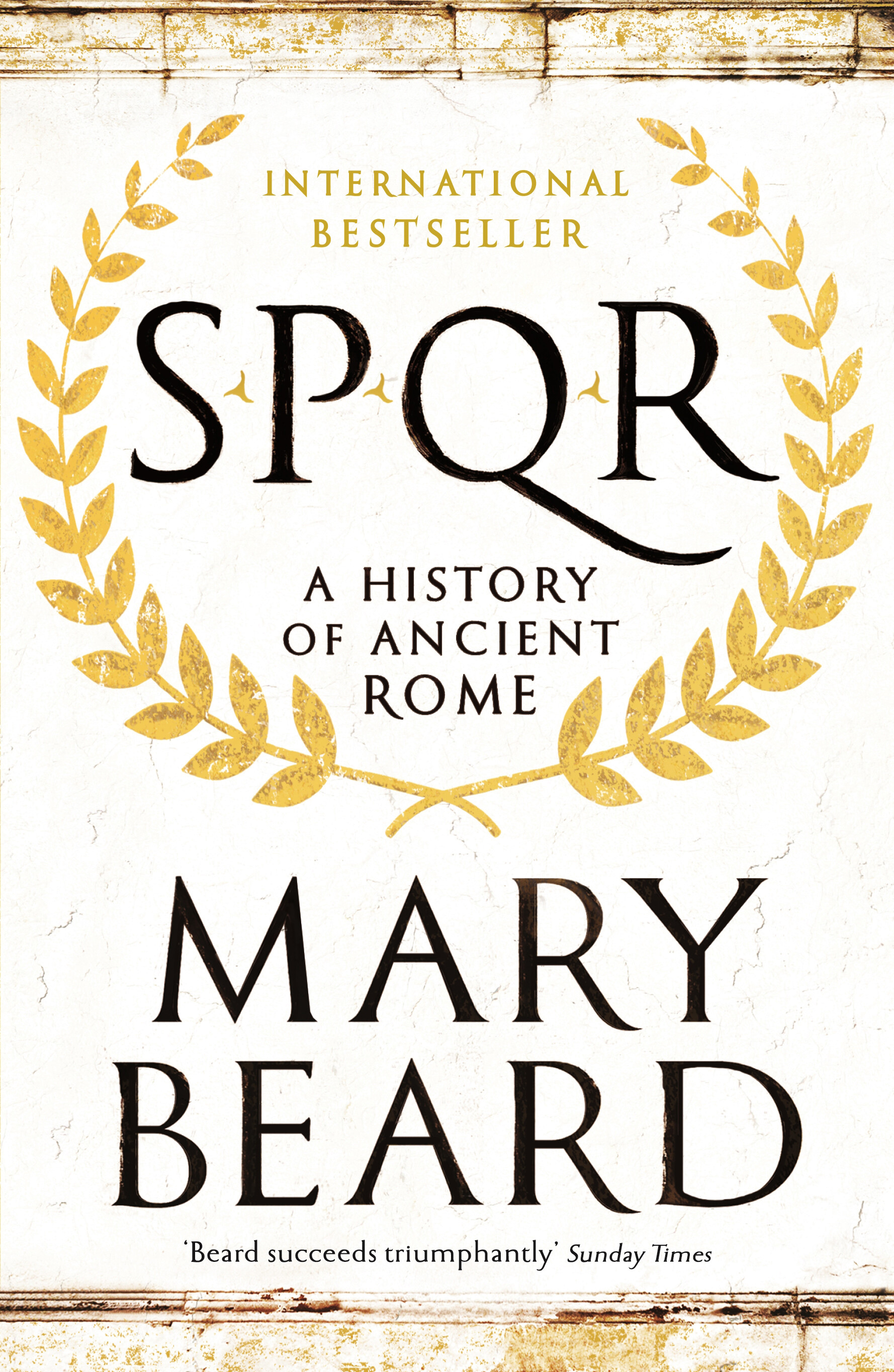 the paperback cover as i read it, title over author's name in black serif over white. the font is probably Trajan idk (haha). a crown (of gold laurel?) surrounds the titleINTERNATIONALBESTSELLERSPOR A HISTORYOF ANCIENTROME MARYBEARD'Beard succeeds triumphantly Sunday Times