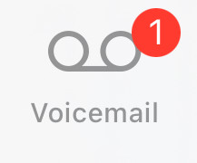 iPhone "Phone" app notification indicator screenshot, a white "1" in a red circle over what looks like a very abstract magnetic tape reel to reel icon over the word "Voicemail" in dark gray