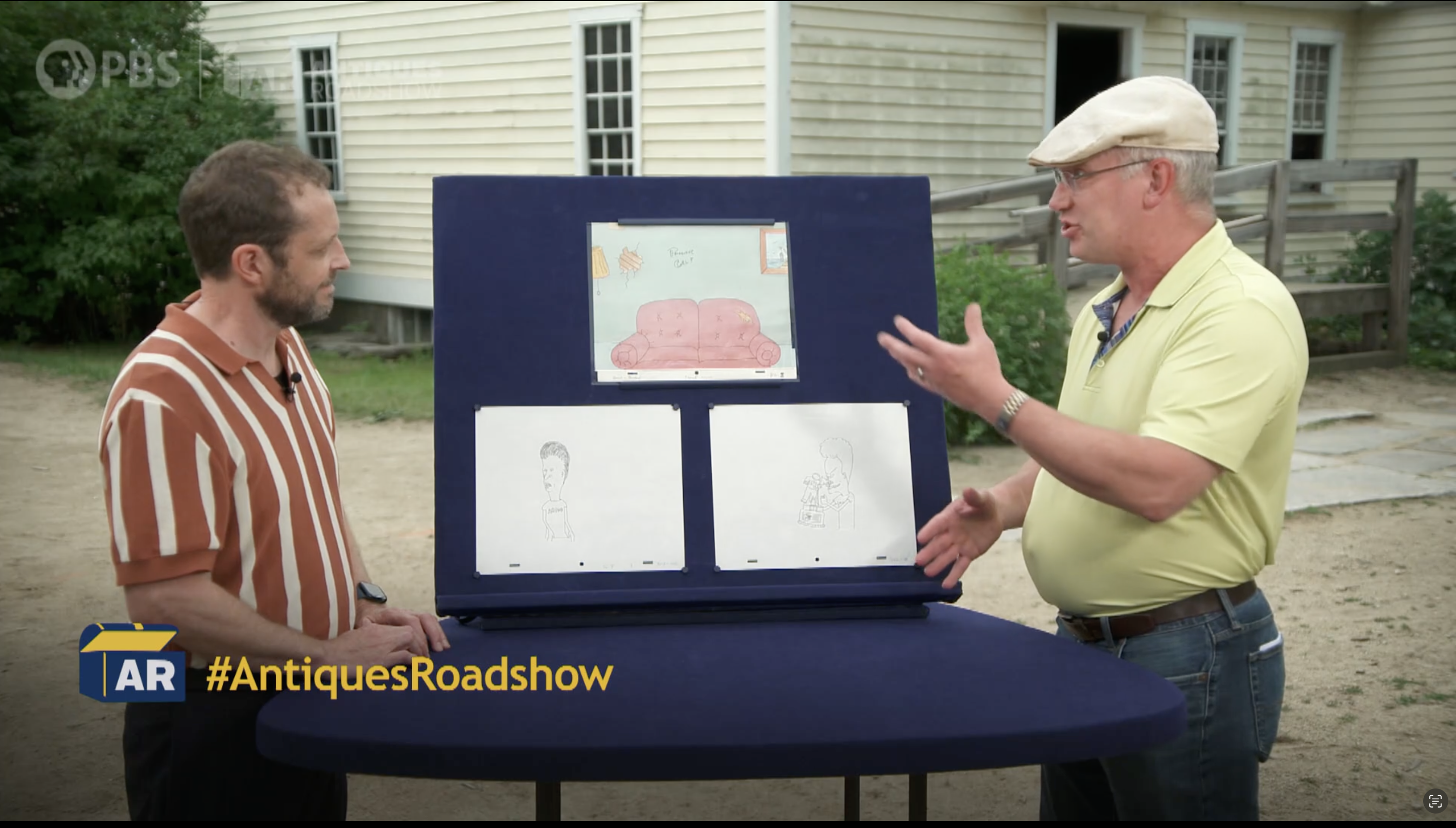 Screen grab of Antiques Roadshow in Plex. A guest on the right in a yellow polo shirt and a tan derby hat is talking with his hands about how he acquired the antique he has brought for appraisal. The roadshow staff, in a vertical stripe polo shirt listens attentively. Between them, propped on a table, is three drawings mounted on a blue felt board. top center: the color pen and watercolor on paper of the original sofa background from the first season of Beavis and Butthead. Below left, a pen and paper drawing of Butthead. Below right, a pen and paper drawing of Beavis.The appraiser estimates the sofa to be $1,000, auction price, and the two drawings that are not colored to be $1,000 together, or $500 a piece.