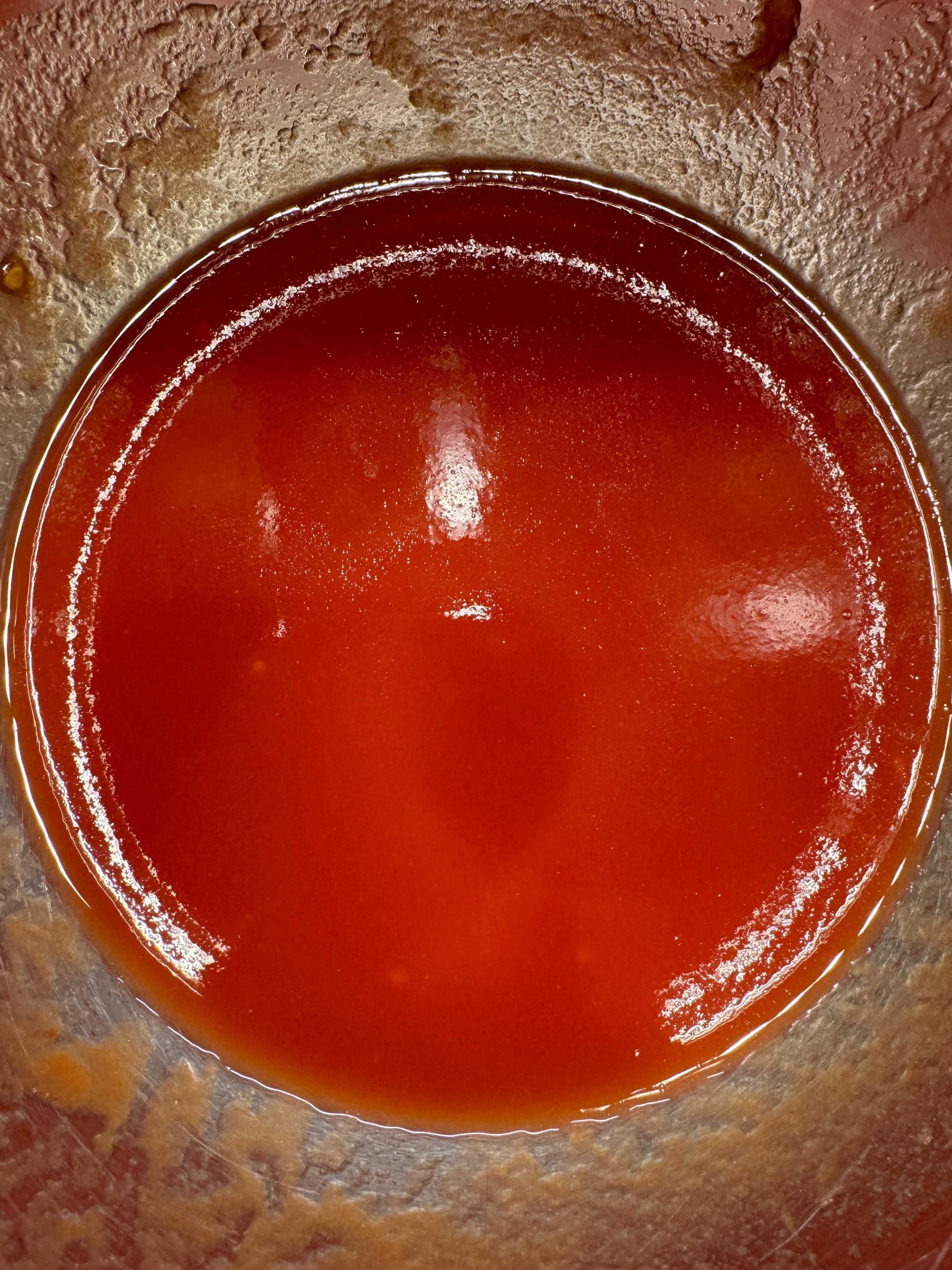 reserved sauce from a 22 ounce can of whole peeled san marzanos, add with finishings for brightness or earlier if the tomatoes start to burn, or split the difference